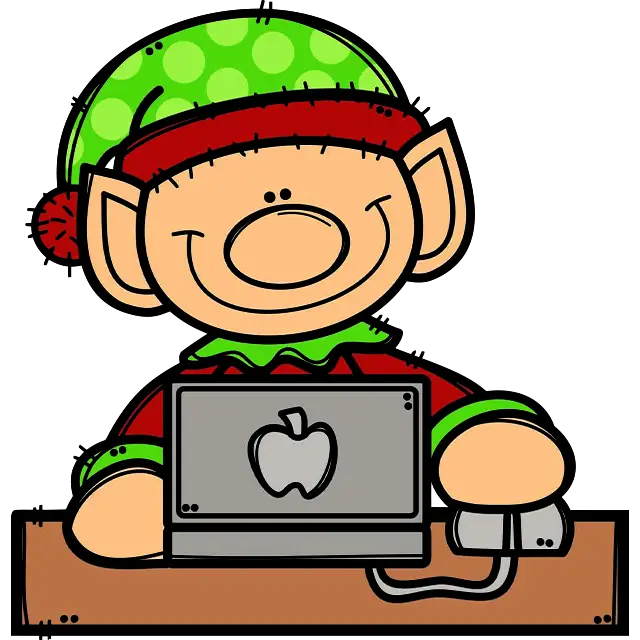 Elfo di Natale con computer immagine a colori